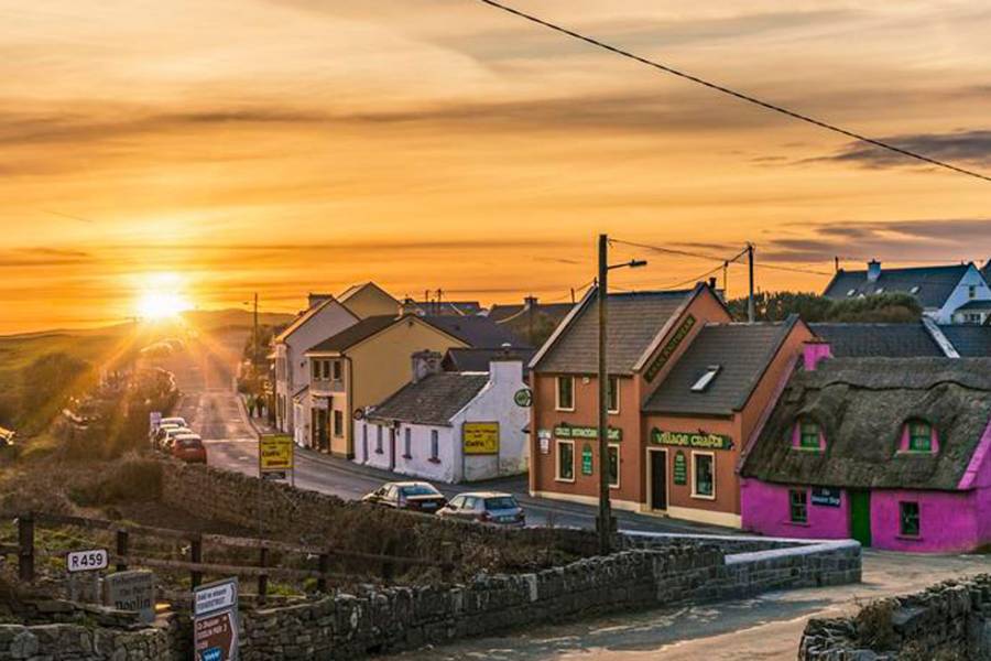 Fisher Street in Doolin Ireland with a sunset
