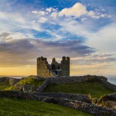 O'Brien's Castle on Inis Oirr with a sunset